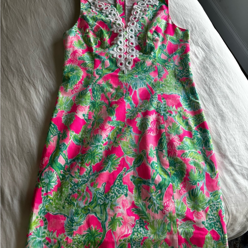 Vibrant Lilly Pulitzer Sleeveless Dress with Floral Pattern. Zippered back.